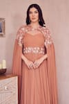 Swish By Dolcy And Simran_Rose Gold Georgette Embellished Pearl Sweetheart Evening Skies Gown With Cape _Online_at_Aza_Fashions