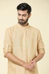 Shop_Arihant Rai Sinha_Beige Linen Plain Mandarin Collar Kurta _Online_at_Aza_Fashions