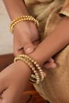 Buy_Smars Jewelry_Gold Plated Synthetic Stone Studded Antique Bangles-Set of 4 _at_Aza_Fashions