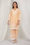 Buy_Label Muslin_Orange Cotton Embroidery Asymmetric Papaya Kurta With Pant _at_Aza_Fashions