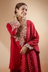 Mrunalini Rao_Red Embroidered Floral Scalloped V Kurta Palazzo Set _at_Aza_Fashions