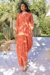 Shop_MEHER BY ISLIE_Orange Natural Crepe Print Floral High Round Harem Jumpsuit _at_Aza_Fashions