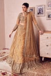 Buy_Swish By Dolcy And Simran_Gold Net Lining Shantoon Embroidery Sequin Dripping Gul Bridal Lehenga Set _at_Aza_Fashions