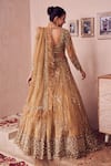 Shop_Swish By Dolcy And Simran_Gold Net Lining Shantoon Embroidery Sequin Dripping Gul Bridal Lehenga Set _at_Aza_Fashions