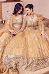 Shop_Swish By Dolcy And Simran_Gold Net Lining Shantoon Embroidery Sequin Dripping Gul Bridal Lehenga Set _Online_at_Aza_Fashions