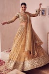 Swish By Dolcy And Simran_Gold Net Lining Shantoon Embroidery Sequin Dripping Gul Bridal Lehenga Set _at_Aza_Fashions