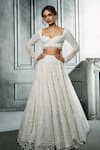 Buy_Isa By Dolly Wahal_Ivory Net Hand Embroidery Sequins Sweetheart Ira Lehenga Set 