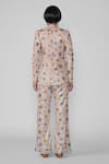 Shop_Aisha Rao_Ivory Sequin Tulle Printed Abstract Lapel Collar Blazer And Pant Set _at_Aza_Fashions