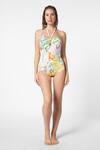 Buy_Ekastories_White Lycra Halter Floral Pattern Swimsuit _at_Aza_Fashions