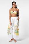 Buy_Ekastories_White Flex Print Sunny Bloom Eden Flared Pant _at_Aza_Fashions