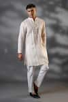 Buy_MENERO_Ivory Chanderi Silk Embroidered Thread Criss Cross Work Kurta And Pant Set _at_Aza_Fashions