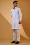 MENERO_White Pure Crepe Lycra Embroidered Pita Floral Work Kurta And Pant Set _at_Aza_Fashions