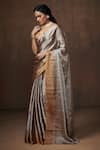 Shop_Dressfolk_Silver Tissue Plain Metallic Handloom Saree With Unstitched Blouse Piece _Online_at_Aza_Fashions