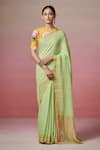 Buy_Dressfolk_Green Linen Woven Metallic Zari Border Saree With Unstitched Blouse Piece _at_Aza_Fashions