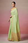 Dressfolk_Green Linen Woven Metallic Zari Border Saree With Unstitched Blouse Piece _Online_at_Aza_Fashions