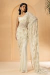 Buy_Quench A Thirst_Ivory Georgette Embellished Cutdana Pearl Pre-stitched Saree With Blouse _at_Aza_Fashions