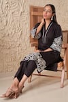 Samatvam by Anjali Bhaskar_Black Cotton Poplin Embroidery Floral Ira Cutwork Straight Kurta With Pant _at_Aza_Fashions