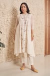 Buy_Samatvam by Anjali Bhaskar_Ivory Chanderi Embroidery Floral Round Ishani Asymmetric Kurta With Pant _at_Aza_Fashions