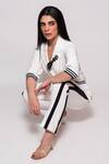 Veera Wear_White Armani Embellished Lapel Collar Feather Blazer With Side Tape Pant _Online_at_Aza_Fashions