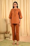 Veera Wear_Brown Cotton Stitchline Round Neck Work Front Tie Up Tunic With Pant _Online_at_Aza_Fashions