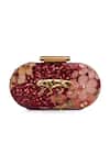 Buy Sabyasachi Burgundy Embellished Oval Shaped Clutch at Aza Fashions Buy_Sabyasachi_Burgundy Embellished Oval Shaped Clutch_at_Aza_Fashions