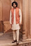 Buy_Contrast By Parth_Orange Linen Silk Embellished Dori Floral Bundi And Kurta Set _at_Aza_Fashions