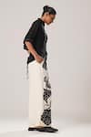 Buy_ATBW_White Raw Silk Satin Embellished Flower Detailed Flared Pant _Online_at_Aza_Fashions