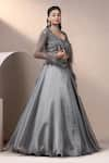 Shop_Chaashni by Maansi and Ketan_Grey Shimmer Organza Embellished Pearl Blouse Bead Waist Lehenga Set With Cape _Online_at_Aza_Fashions