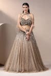 Buy_Chaashni by Maansi and Ketan_Gold Net Embroidered Pearl Blouse Plunge Lehenga Set With Cape _at_Aza_Fashions