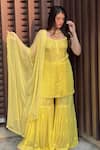 Buy_LABEL AISHWARYRIKA_Yellow Georgette Embroidery Chikankari Scoop Neck Rose Kurta Gharara Set _at_Aza_Fashions