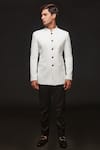 Shop_Sven suits_White Japanese Stretch Plain Jodhpuri With Trouser _Online_at_Aza_Fashions