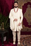 Buy_Sven suits_Ivory Raw Silk Embroidered Thread Floral Butti Sherwani Set _at_Aza_Fashions