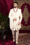 Sven suits_Ivory Raw Silk Embroidered Thread Floral Butti Sherwani Set _Online_at_Aza_Fashions