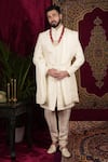 Buy_Sven suits_Ivory Raw Silk Embroidered Thread Floral Butti Sherwani Set _Online_at_Aza_Fashions