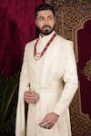 Buy_Sven suits_Ivory Raw Silk Embroidered Thread Floral Butti Sherwani Set 