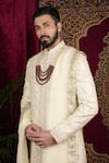 Buy_Sven suits_Ivory Silk Embroidered Zari Floral Vine Sherwani Set 