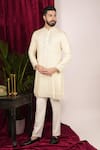 Sven suits_Cream Faux Silk Embroidery Mirror Scattered Kurta Set _at_Aza_Fashions