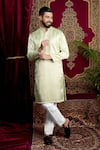 Buy_Sven suits_Green Faux Silk Embroidery Thread Mirror Hand Kurta Set _at_Aza_Fashions