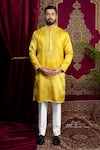 Buy_Sven suits_Yellow Faux Silk Embroidery Thread Paisley Kurta Set _at_Aza_Fashions