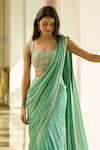 Chamee and Palak_Green Georgette Embroidered Sequin Square Nina Pre-draped Saree With Blouse _at_Aza_Fashions