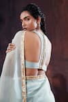 AFFROZ_Blue Tissue Silk Embroidery Cutdana Halter Neck Border Saree With Blouse _at_Aza_Fashions