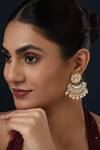 Buy_MINAKI_White Kundan Studded Floral Crecent Chandbali Earrings _at_Aza_Fashions