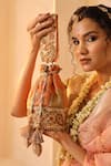 Buy_THE TAN CLAN_Gold Thread Radha Embroidered Potli Bag _at_Aza_Fashions