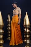 Shop_ASHUTOSH JOSHI_Orange Bemberg Satin Hand Embroidered Resham Aarya Blouse And Knot Skirt _Online_at_Aza_Fashions