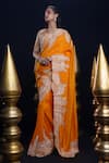 Buy_ASHUTOSH JOSHI_Orange Raw Silk Hand Embroidered Resham V-neck Pushti Saree Set _at_Aza_Fashions