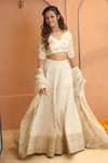 Buy_Izzumi Mehta_Ivory Chanderi Embroidery Zardosi Plunge V-neck Floral Lehenga Set _Online_at_Aza_Fashions