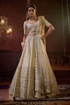 Buy_Kalighata_Ivory Raw Silk Embroidered Shehnai Sequin Embellished Floral Bridal Lehenga Set _at_Aza_Fashions