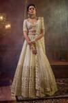 Shop_Kalighata_Ivory Raw Silk Embroidered Shehnai Sequin Embellished Floral Bridal Lehenga Set _at_Aza_Fashions