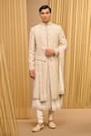 Buy_Tarun Tahiliani_Ivory Raw Silk Hand Embroidered Gold Zari Sherwani Set _at_Aza_Fashions