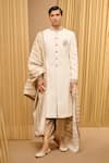 Buy_Tarun Tahiliani_Ivory Textured Fabric Embroidered Paisley Placed Sherwani Set _at_Aza_Fashions